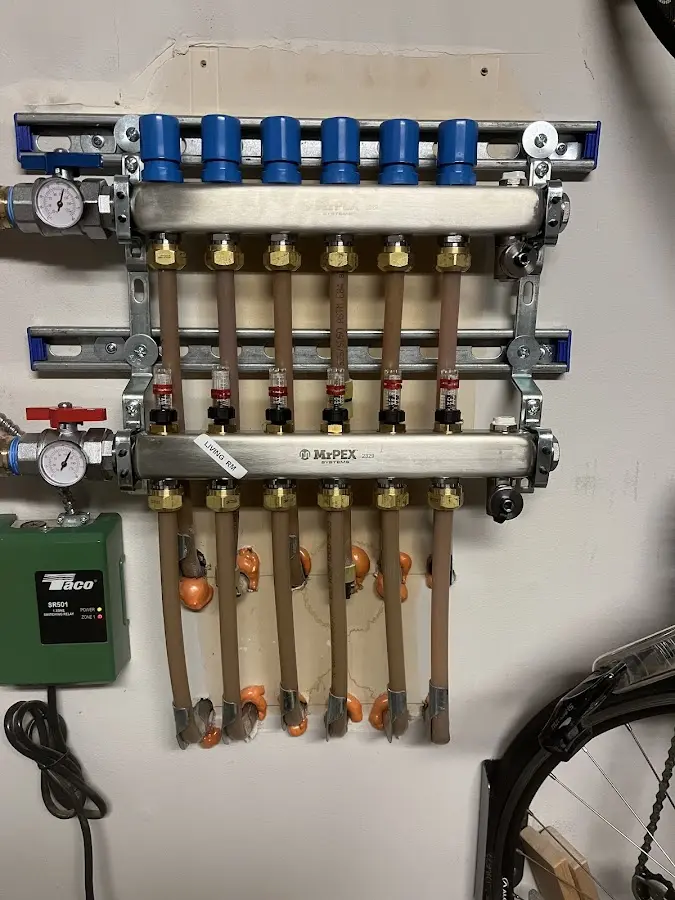 Plumber performing Leak Detection at a residential property in Le Ray