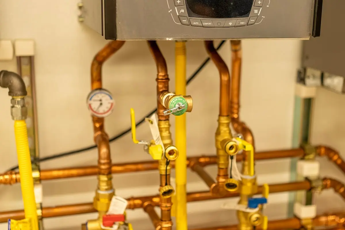 Licensed technician providing Water Heater Installation for a homeowner in Le Ray